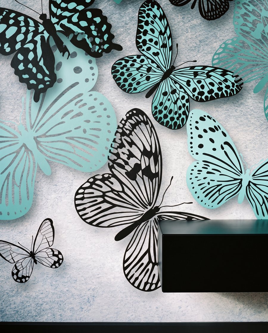Mariposas turquesas en vuelo — detalle