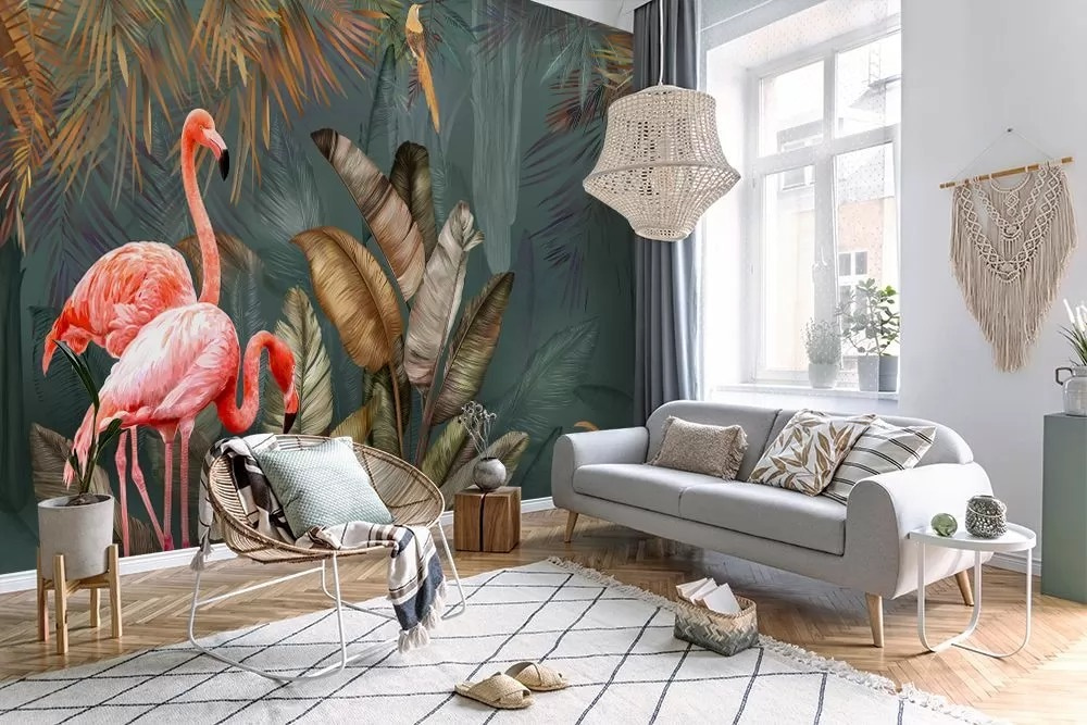 Flamencos entre hojas tropicales en un interior