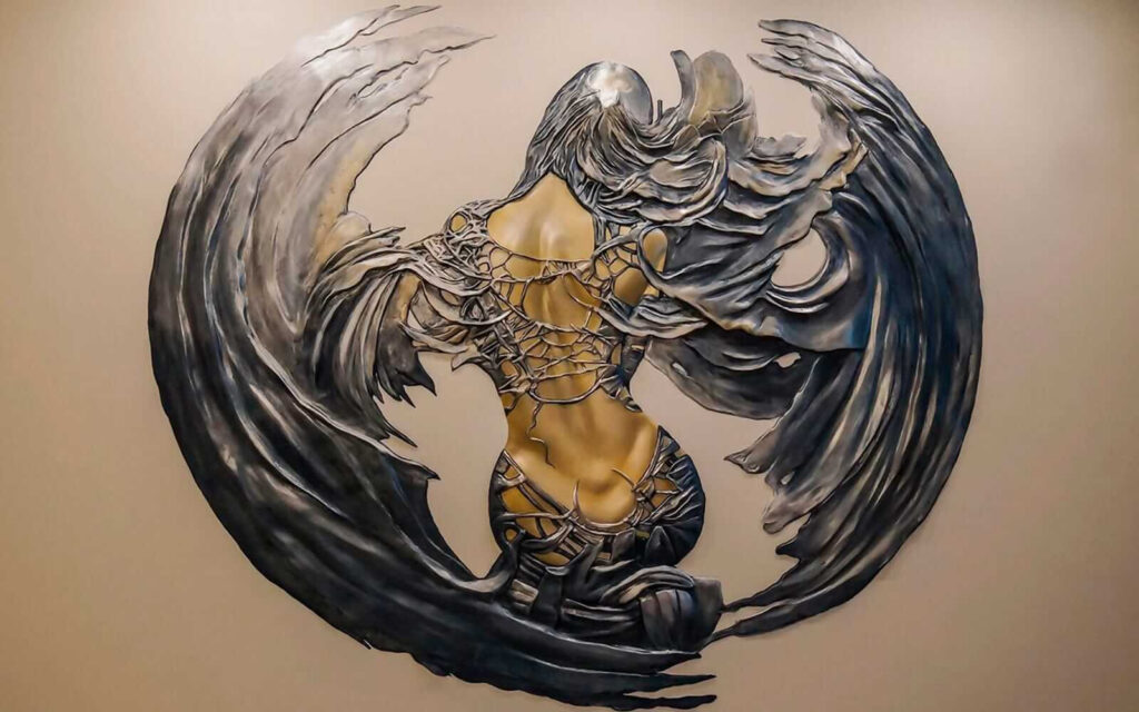 Figura alada ornamentada — diseño completo