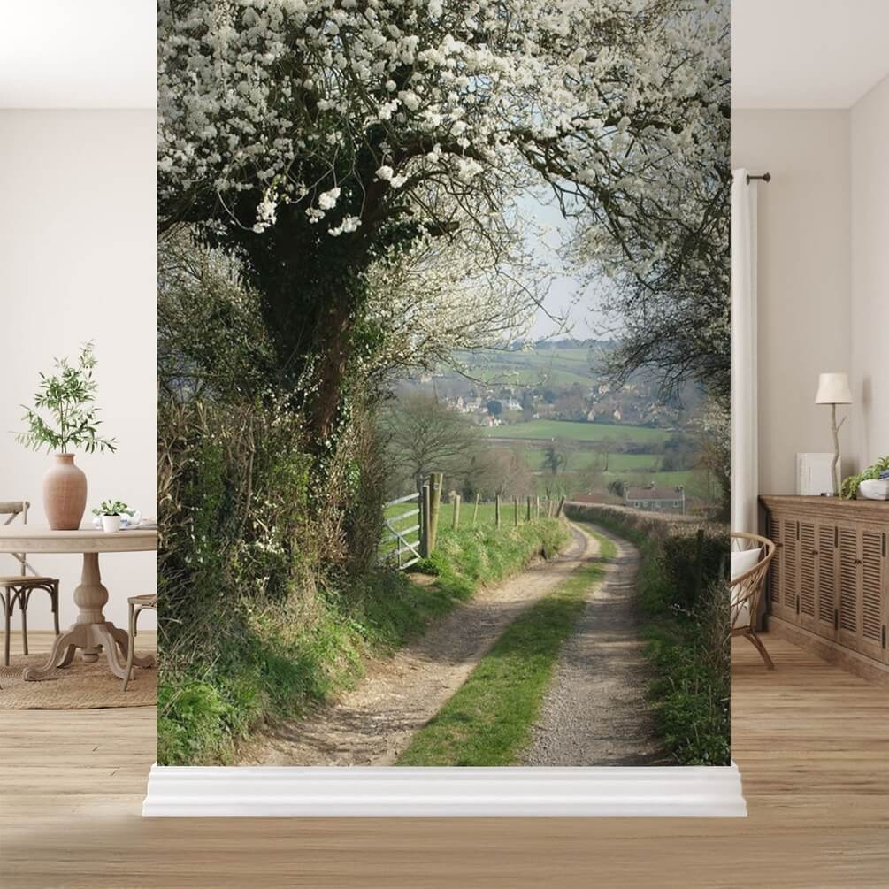 Camino bajo flores blancas en un interior