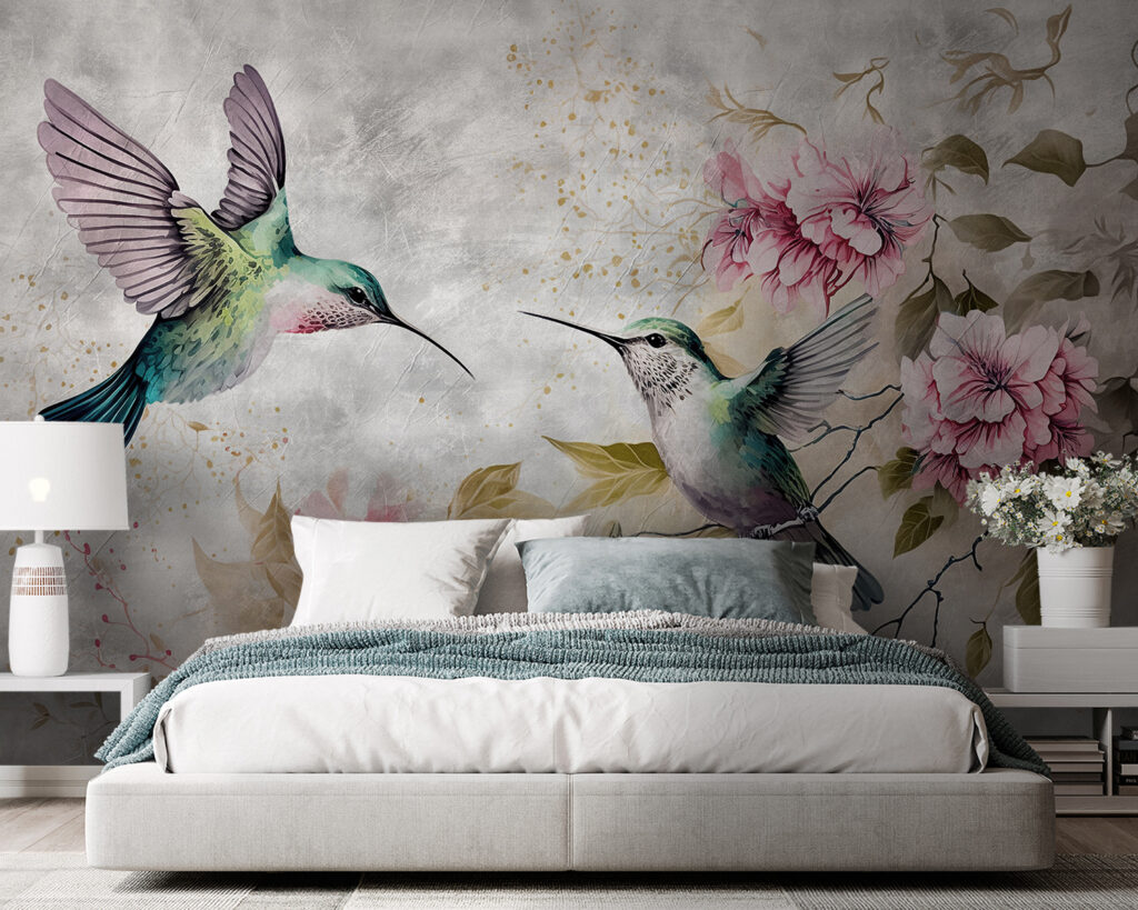 Colibríes junto a flores en un interior