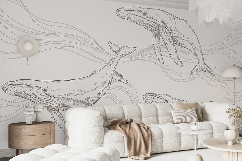 Tres ballenas entre olas — interior 1
