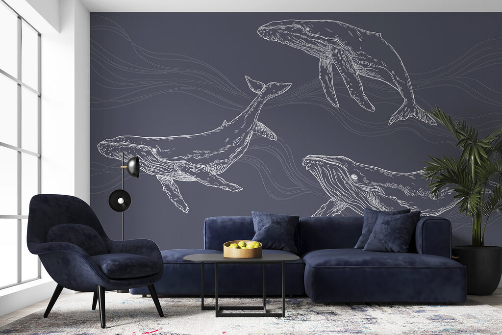 Tres ballenas entre olas en un interior