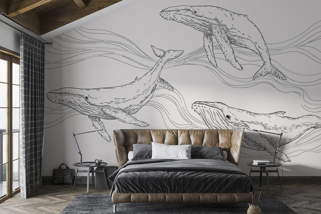 Tres ballenas entre olas — interior 1