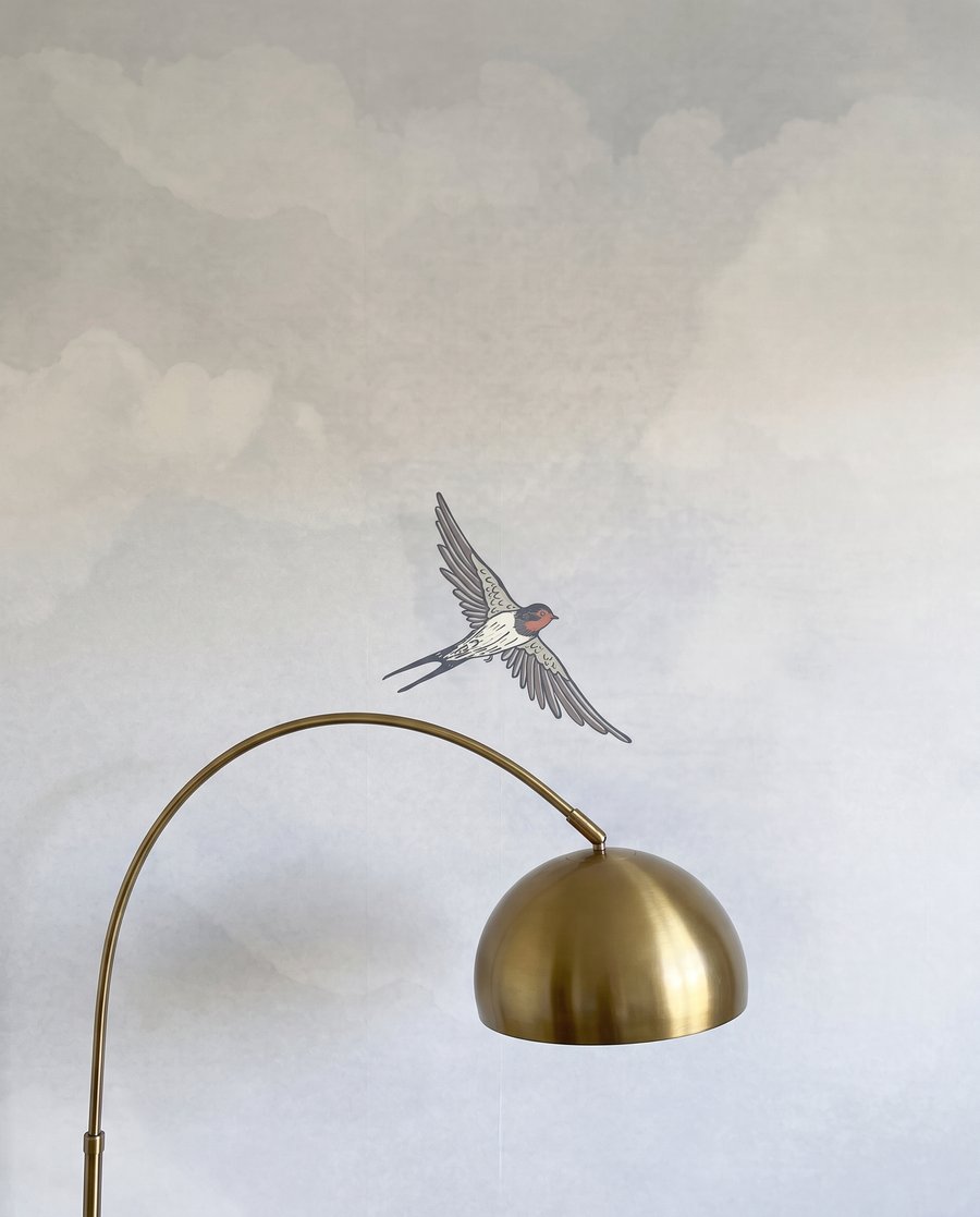 Aves entre nubes — detalle